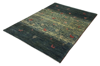 Gabbeh rug (86x62 cm), dark green, with bold patterns featuring red animal and ornamental motifs.