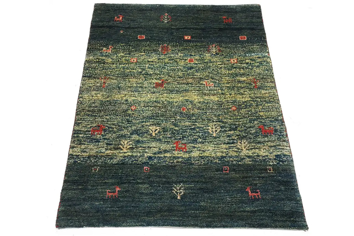 Gabbeh rug 86x62 cm, dark green pile with small red motifs and animals.