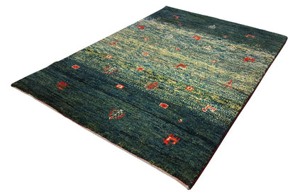 Gabbeh rug 86x62 cm, dark green pile with red ornamental panels and a clean edge.
