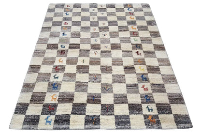 Gabbeh rug, rectangular, beige checkered pattern with colorful symbols