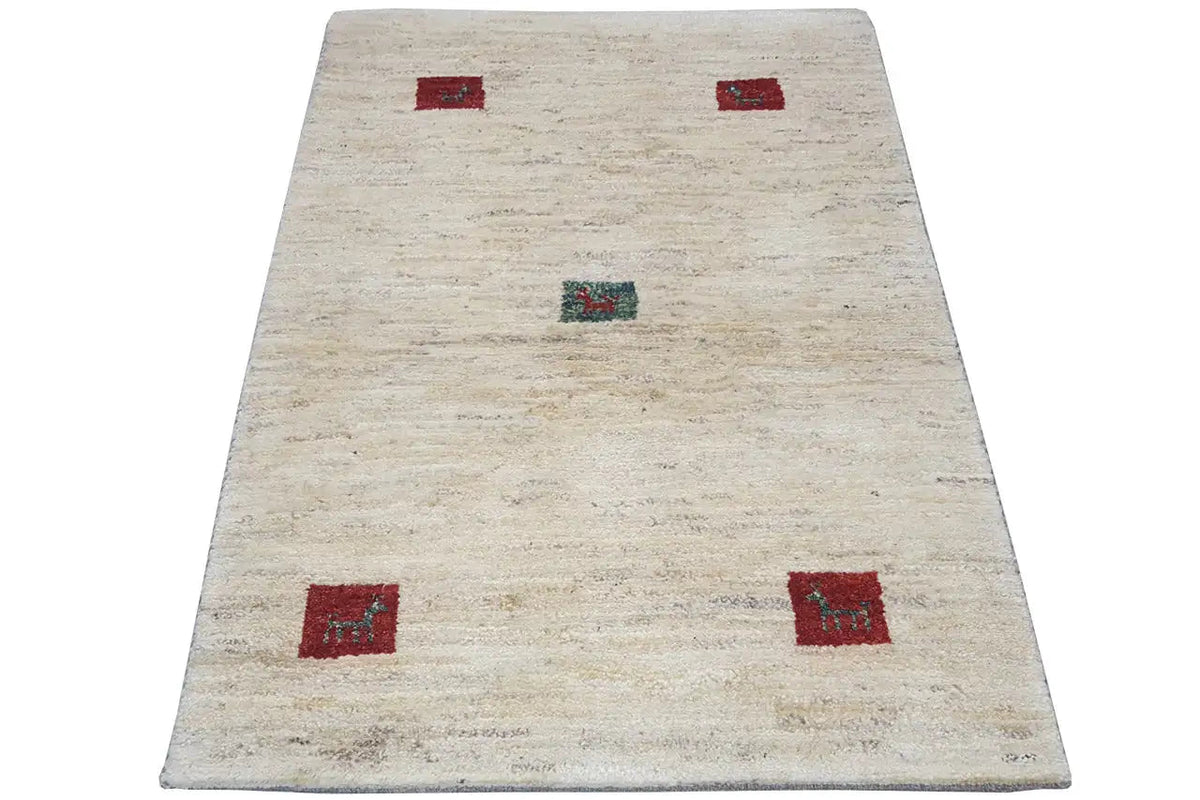 Gabbeh rug, cream-colored, with red and turquoise square motifs, 125×80 cm