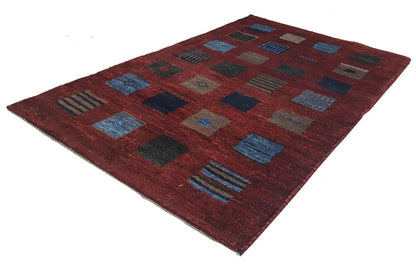 Gabbeh rug 124x80 cm, geometric pattern with red areas and blue accents