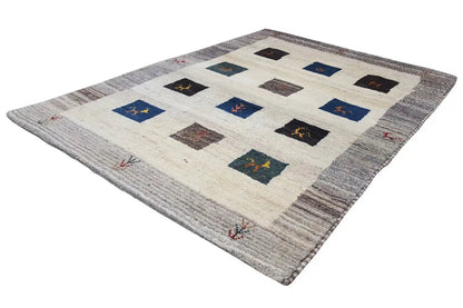 Gabbeh rug, different perspective: cream-colored background, gray border, squares