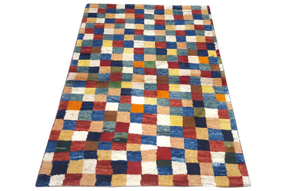 Rug with a multicolored checkered pattern, rectangular, with multiple alternating color blocks