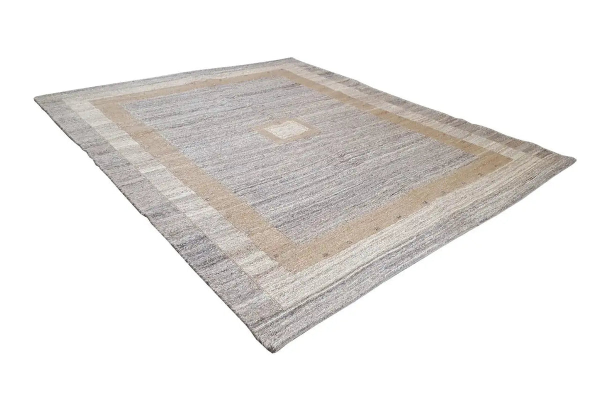 Gray-beige kilim rug with a rectangular border pattern and diamond medallion