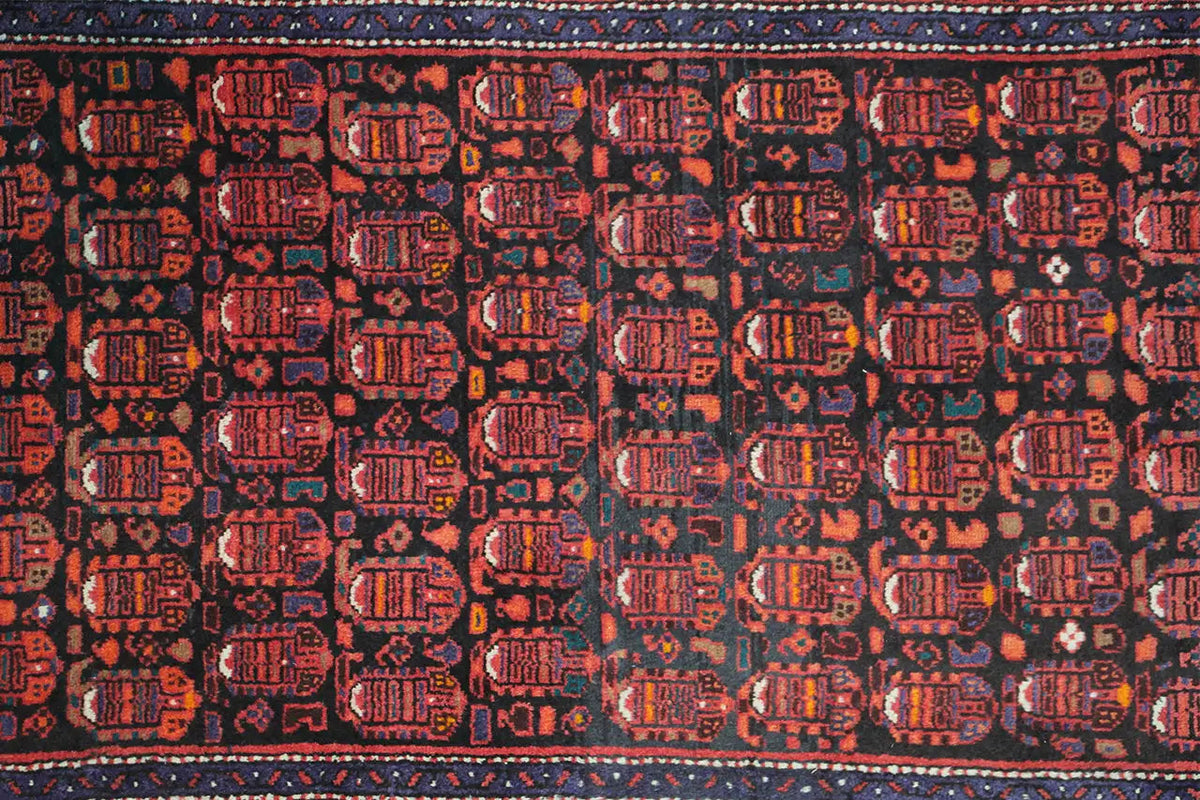 Hamadan runner with geometric pattern, dark red and blue, border and fringe