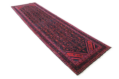 Oriental rug runner with a delicate border pattern in dark blue and pink, rectangular