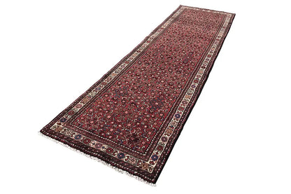 Hamadan rug with fine border lines, a burgundy background, and dark-blue decorative elements