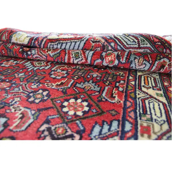 Hamadan rug with a folded edge, red pattern and side border
