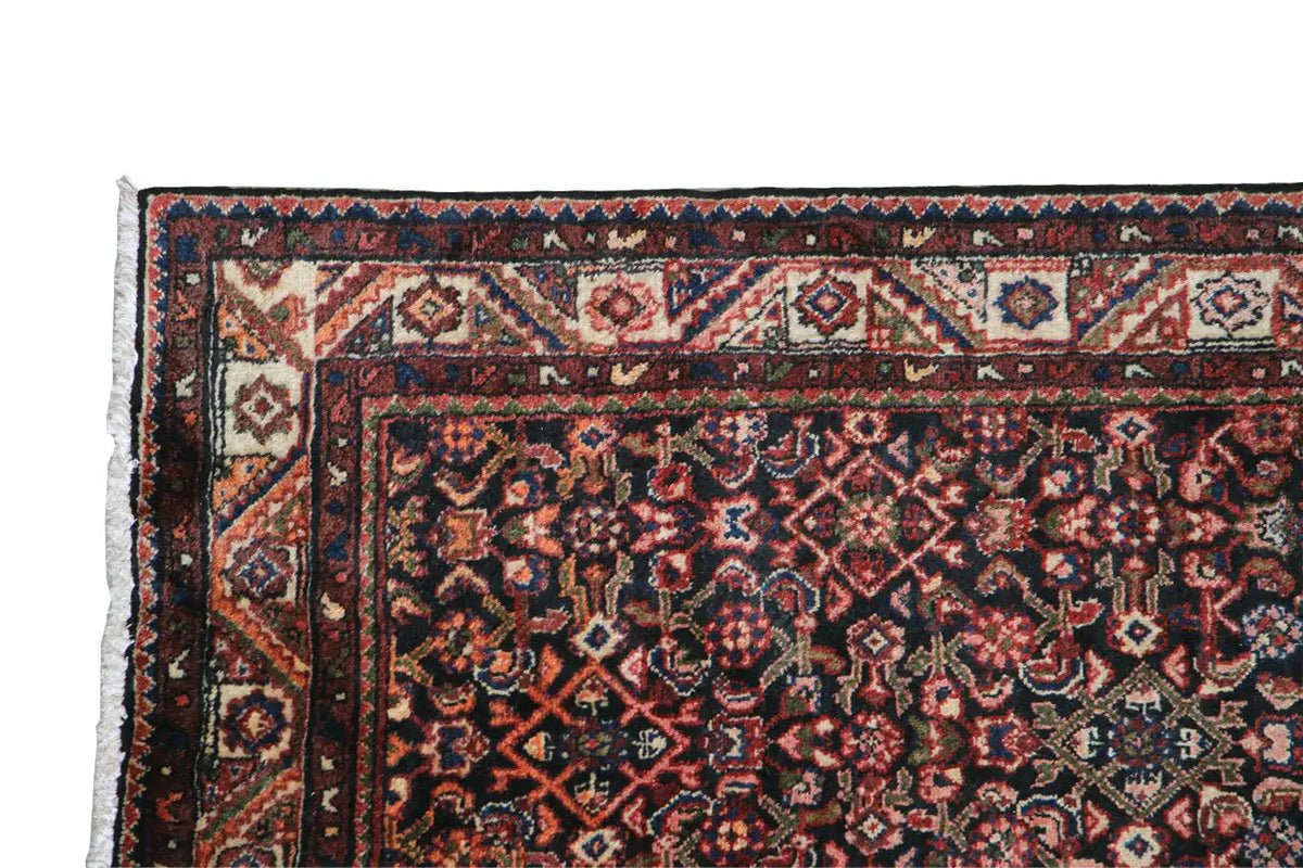 Hamadan runner with an oriental pattern, dark background and multicolored border