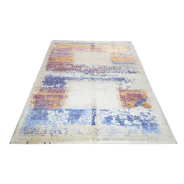 Designer rug, rectangular, abstract pattern in blue, purple, and orange on a light background