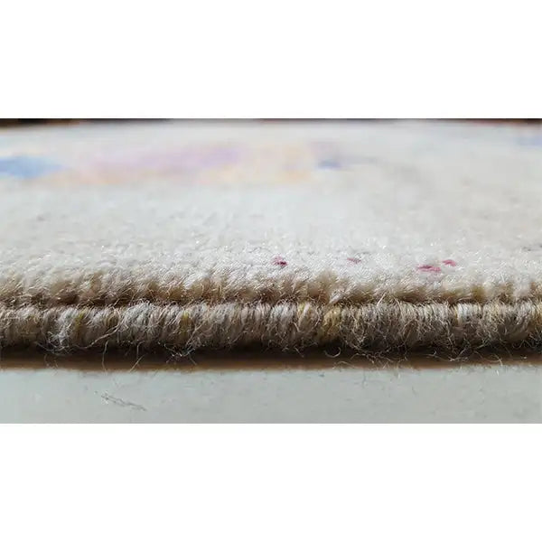 Designer rug, floral design: dense beige and brown border with small colored dots