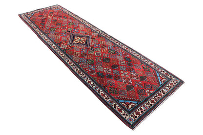 Josheghan runner 370x112 cm with a red background and a geometric pattern along the edges