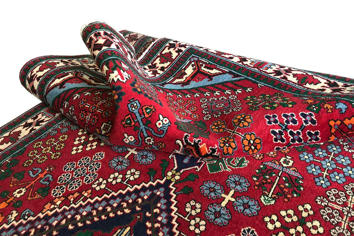 Josheghan runner 370x112 cm, rolled close-up with multicolored geometric details