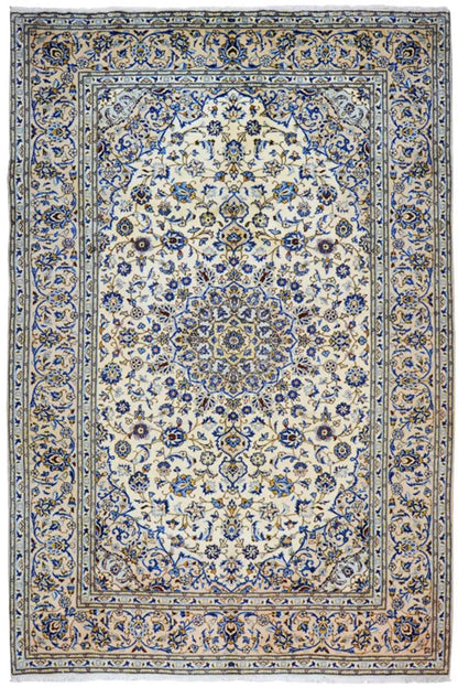 Keshan rug with an ornamental floral pattern in blue and cream, rectangular