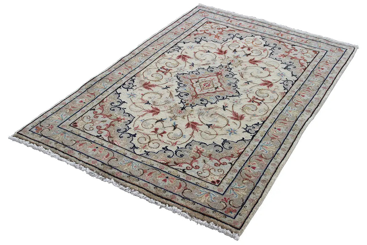 Beige Keshan rug with blue-red ornamental design, rectangular, fringed edge