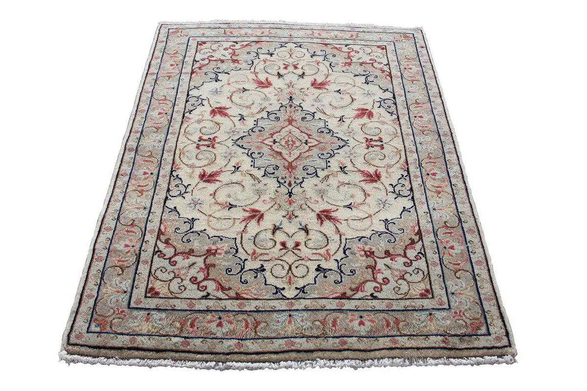 Beige Oriental rug with a blue border and red floral motifs, large-scale