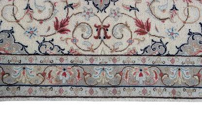 Lower carpet border: beige background with a blue border stripe and red accents