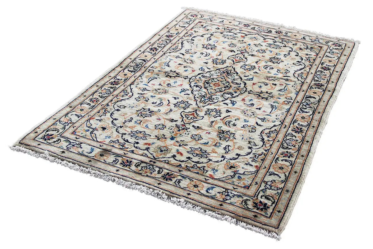 Beige Keshan rug with blue decorative pattern and border, rectangular