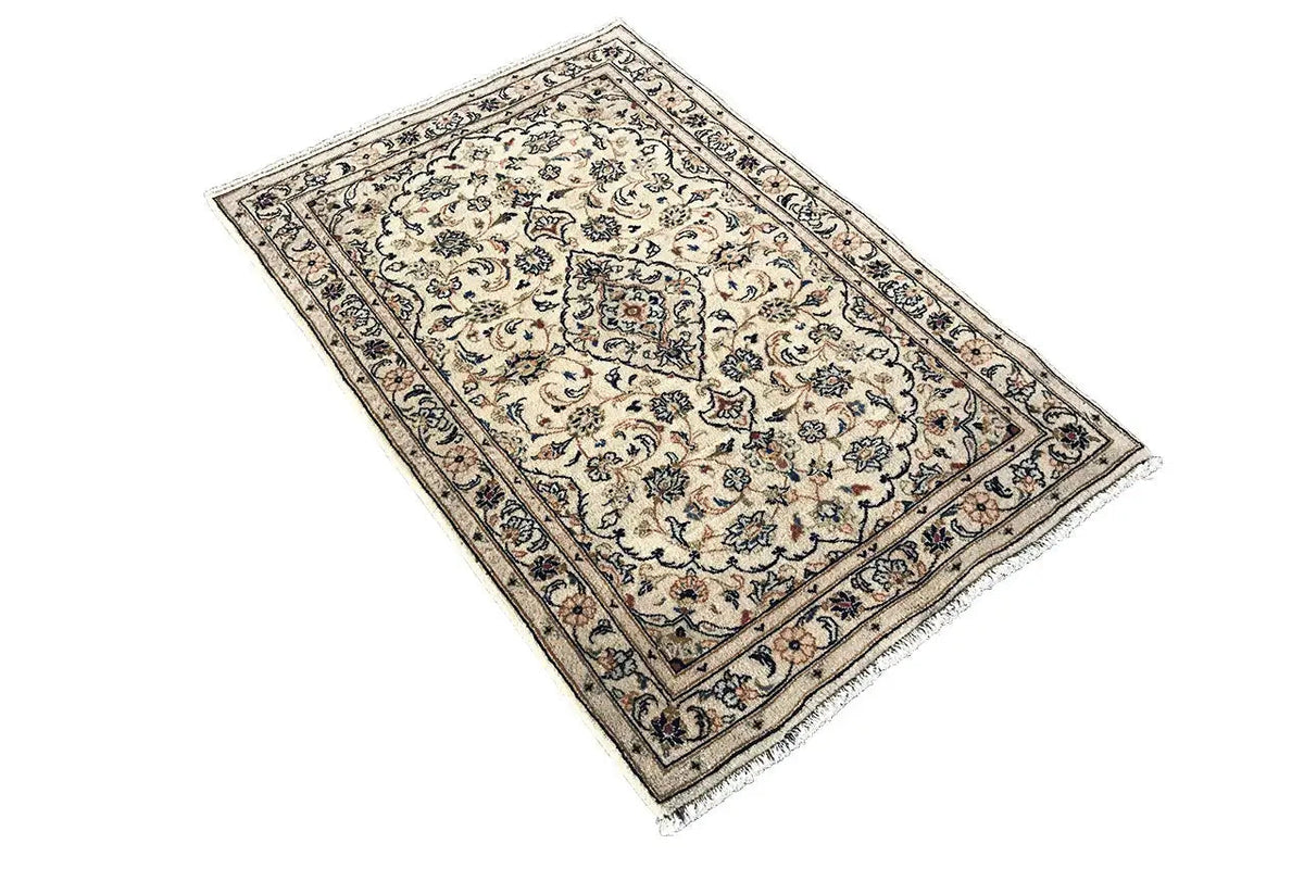 Beige rug with a Baroque pattern, dark blue border, and slightly rounded corners