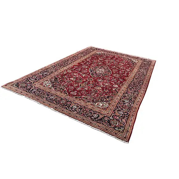 Red Oriental rug with an ornamental field and a dark, finely decorated border