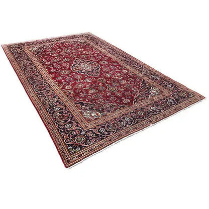 Red Oriental rug with a large central pattern and contrasting border