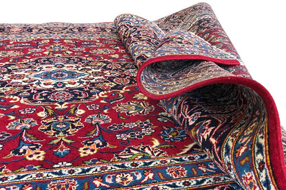 Keshan rug, red multicolored pattern, rolled edge with blue border
