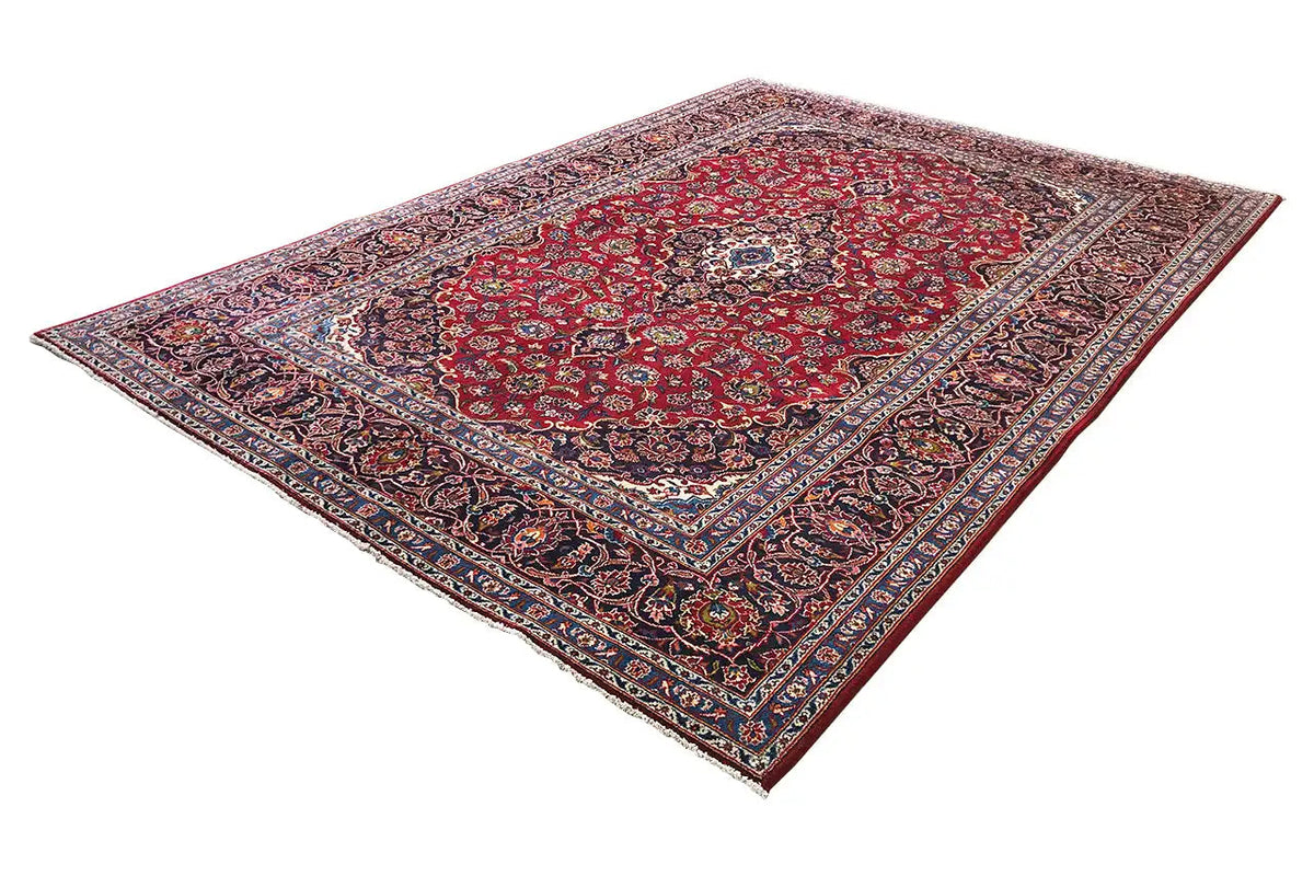 Keshan rug, red, with a delicate ornamental pattern and multicolored borders, diagonal