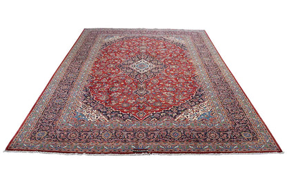 Keshan rug, red medallion with blue ornamental border, rectangular.