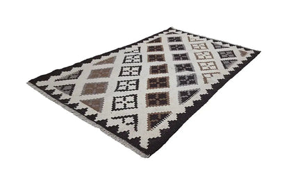 Kilim rug with geometric diamonds, cream-colored background, black and brown