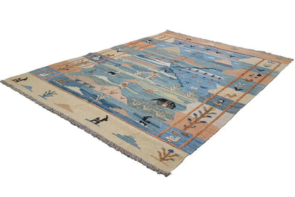 Kilim rug with a blue field and geometric bands of color, fringes at the corners