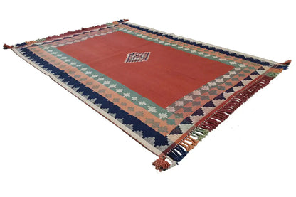 Jajim rug 235x157 cm with a red central area, multicolored border, and fringes