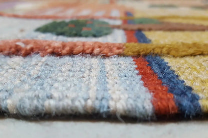 Detail of the kilim fabric with pile and multicolored pattern elements