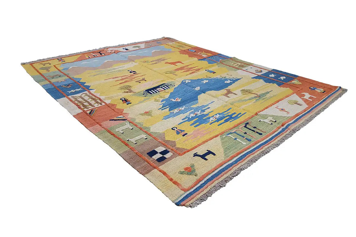 Rectangular kilim rug with detailed patterns in blue, beige, and red