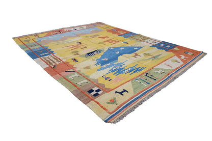 Rectangular kilim rug with detailed patterns in blue, beige, and red