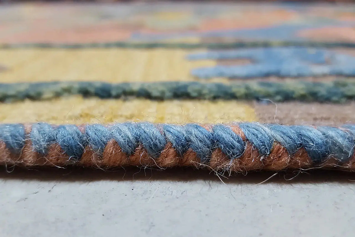 Kilim Qashqai rug detail: bound edge with blue fringe
