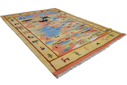 Rectangular kilim rug with a colorful decorative pattern and fringes, angled front view