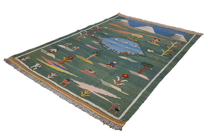 Green kilim rug with landscape design, border all around, and fringes, 147×100 cm