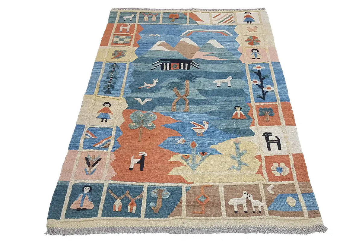 Colorful kilim rug with a blue field, orange border, and fringe along the edges