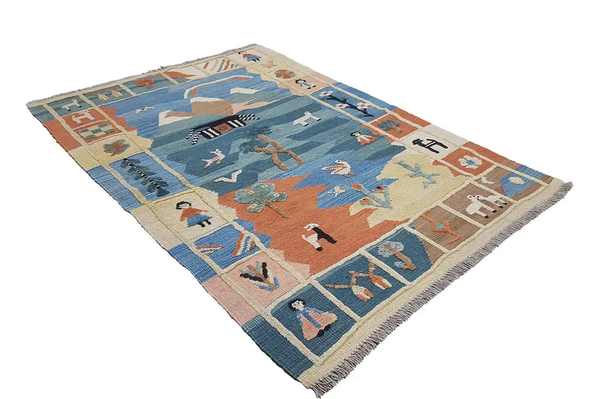 Kilim rug with a blue central area, orange-beige border, and fringe at the corner