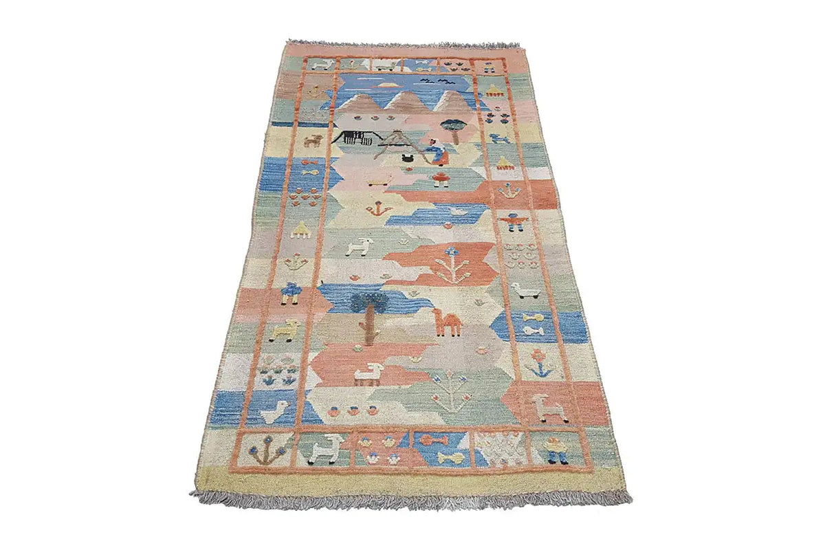Oriental rug in light blue and red tones with a Qashqai pattern, rectangular