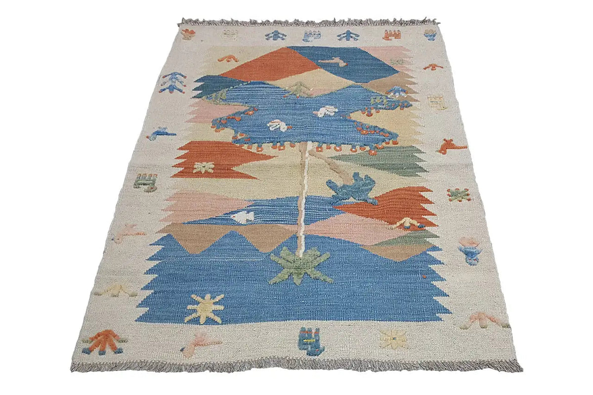 Kilim rug in the Qashqai style, cream-colored with blue, red, and green patterns