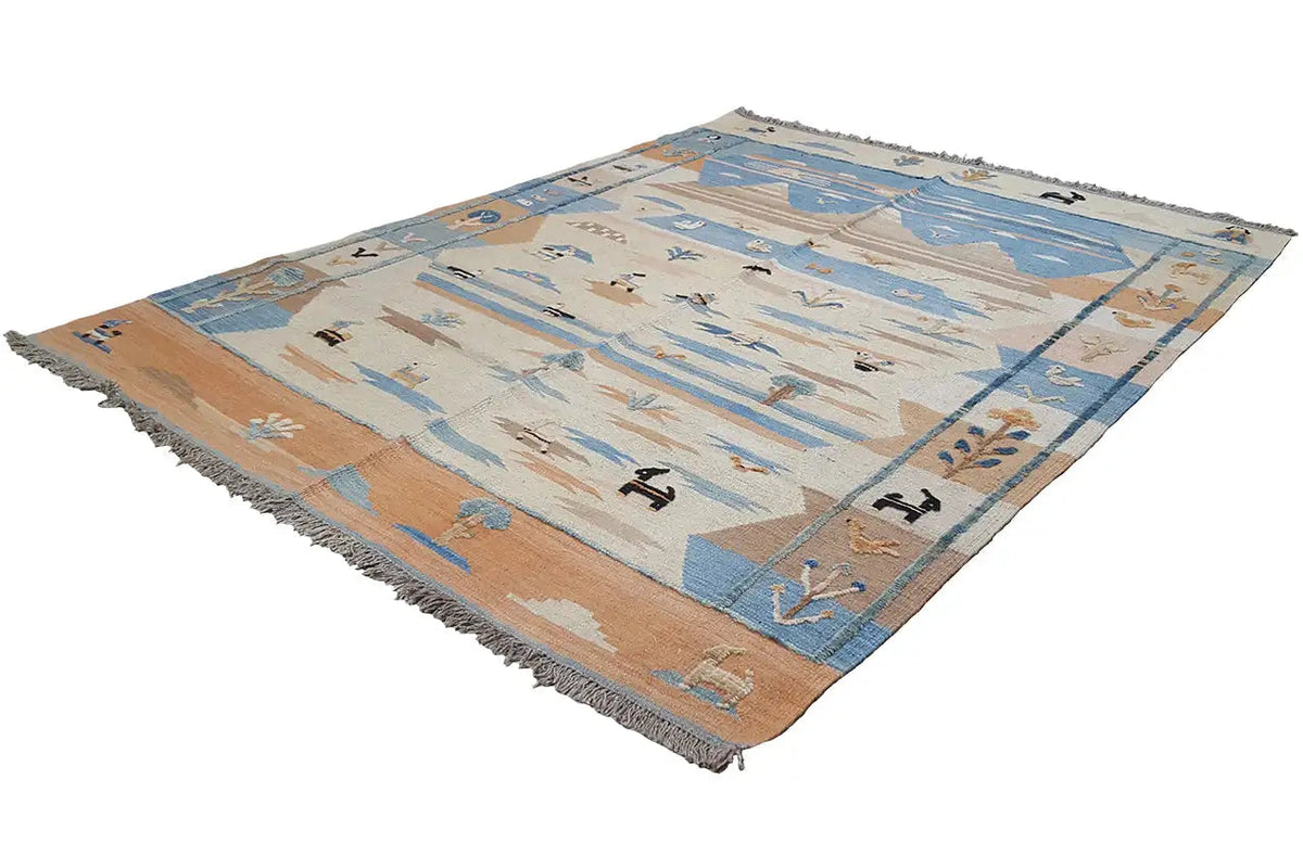 Rectangular kilim rug with blue-brown geometric pattern and fringes