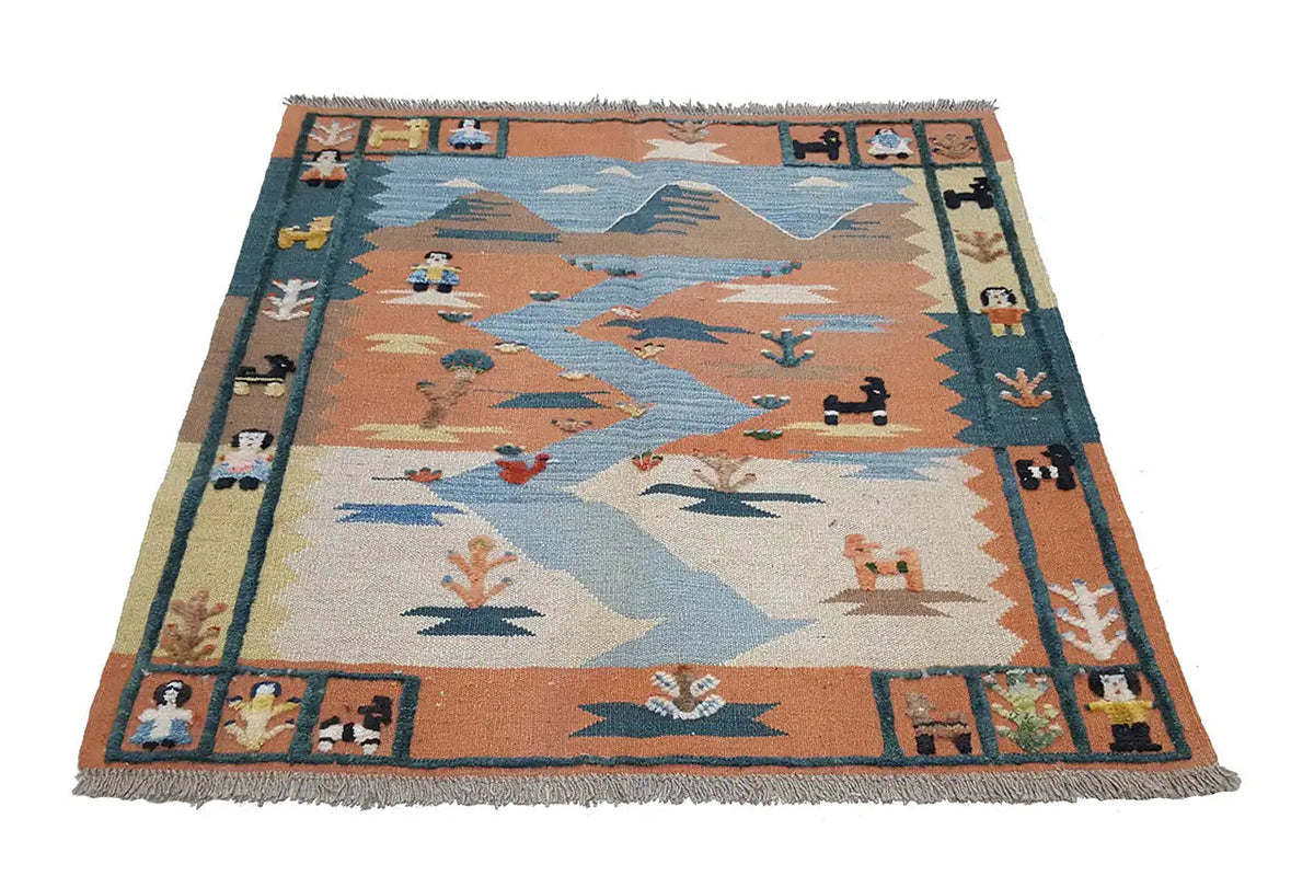 Kilim rug with multicolored patterns in blue, brown, and beige, as well as decorative fringes