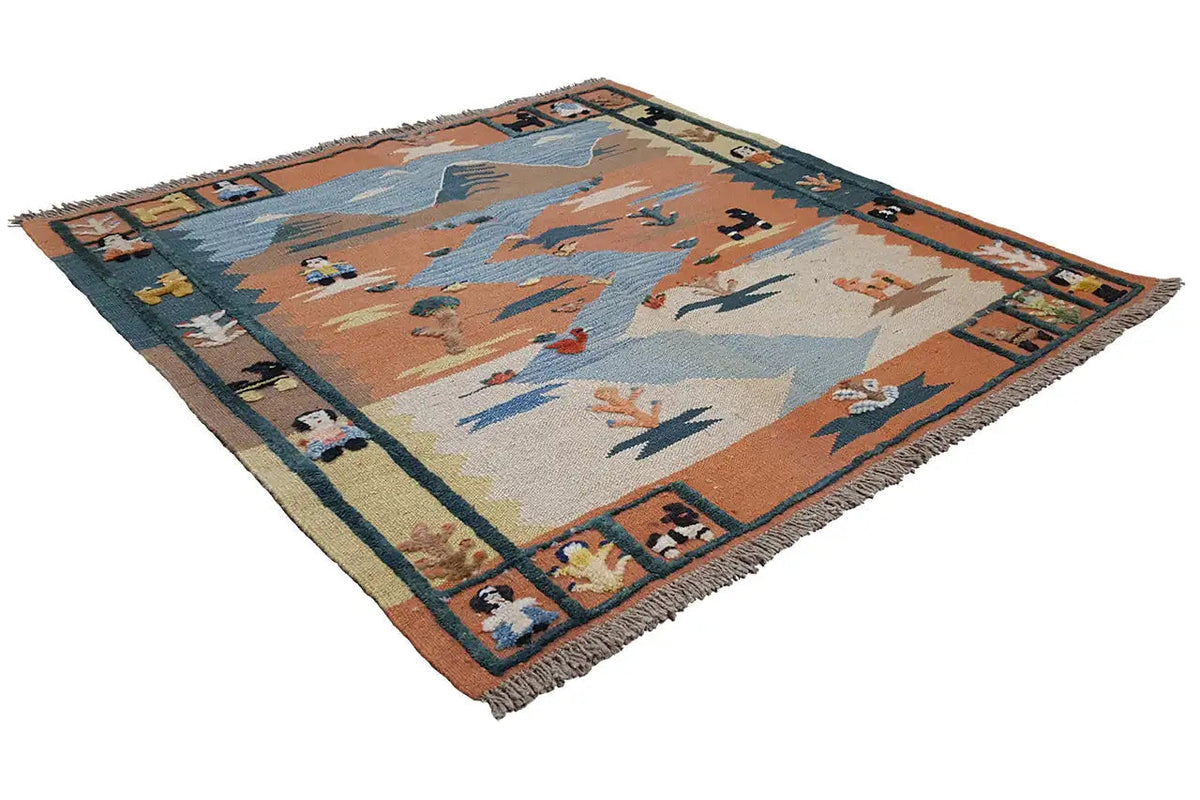 Kilim rug with a patterned design, colorful motifs, and fringes along the edges