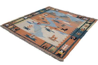 Square kilim rug, multicolored pattern with fringes and a colorful border frame
