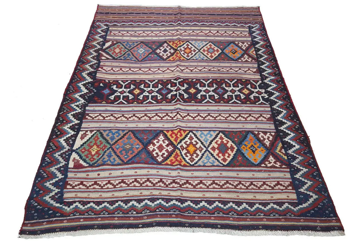 Kilim rug, laid flat; geometric borders in blue, red, and beige