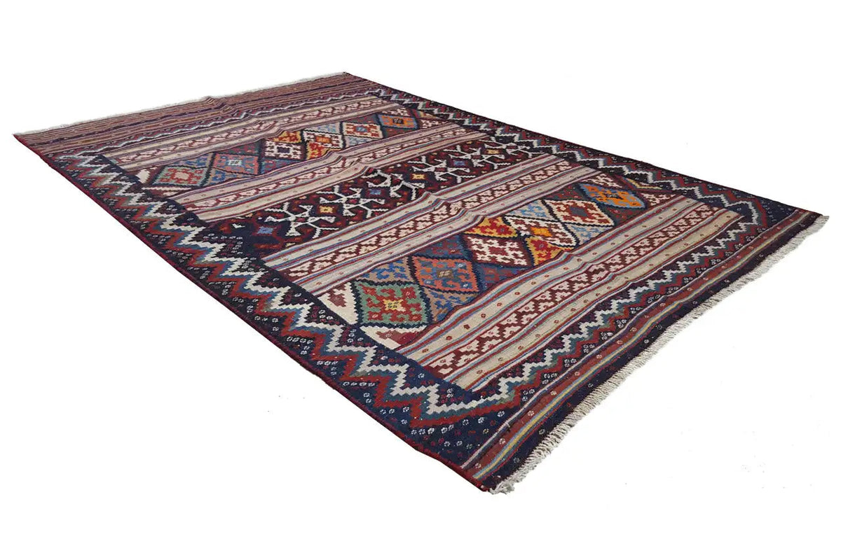 Kilim rug from another perspective; multicolored ornaments and zigzag edges