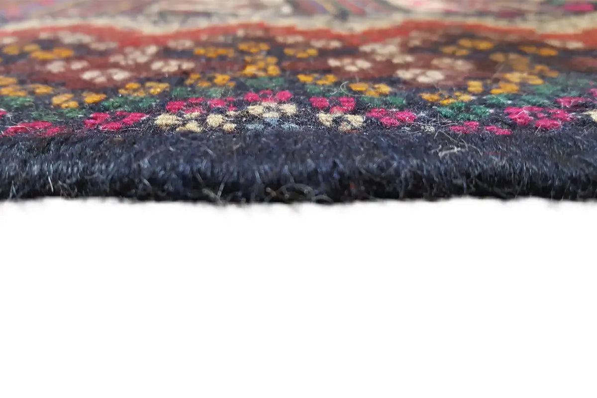 Kilim rug with fringed edges, multicolored pattern on a dark background
