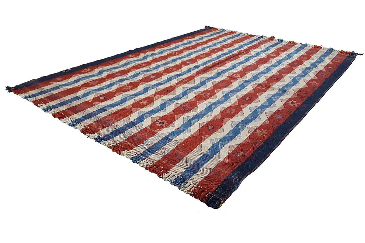 Jajim rug spread diagonally: striped pattern in red, blue and beige, fringes